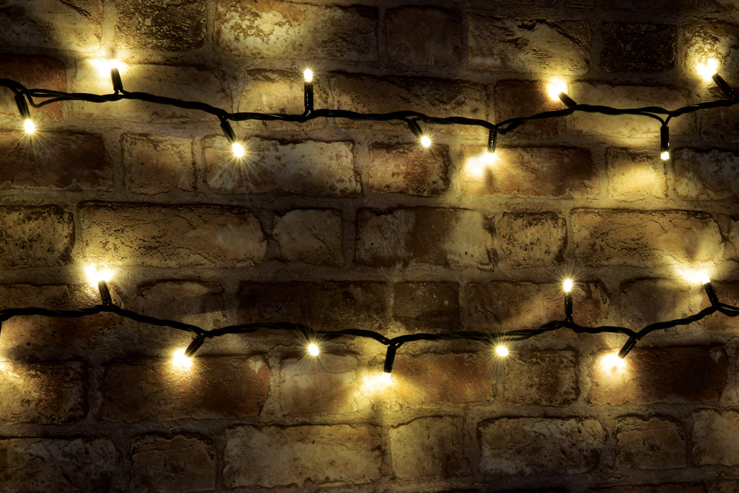 LYYT: 155.404UK, Heavy Duty LED String Lights, 90 LEDs, 10m Warm White, IP44 Rated, Black Cable