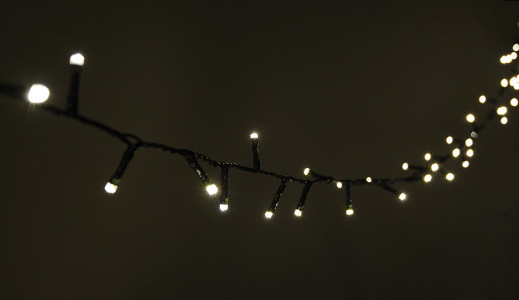 LYYT: 155.465UK, 200 LED Indoor/Sheltered Outdoor String Lights, 10m, Warm White, 24-Hour Timer, Dark Green Cable