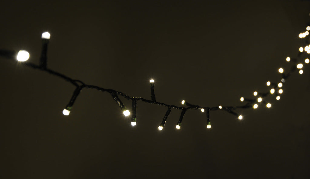 LYYT: 155.465UK, 200 LED Indoor/Sheltered Outdoor String Lights, 10m, Warm White, 24-Hour Timer, Dark Green Cable
