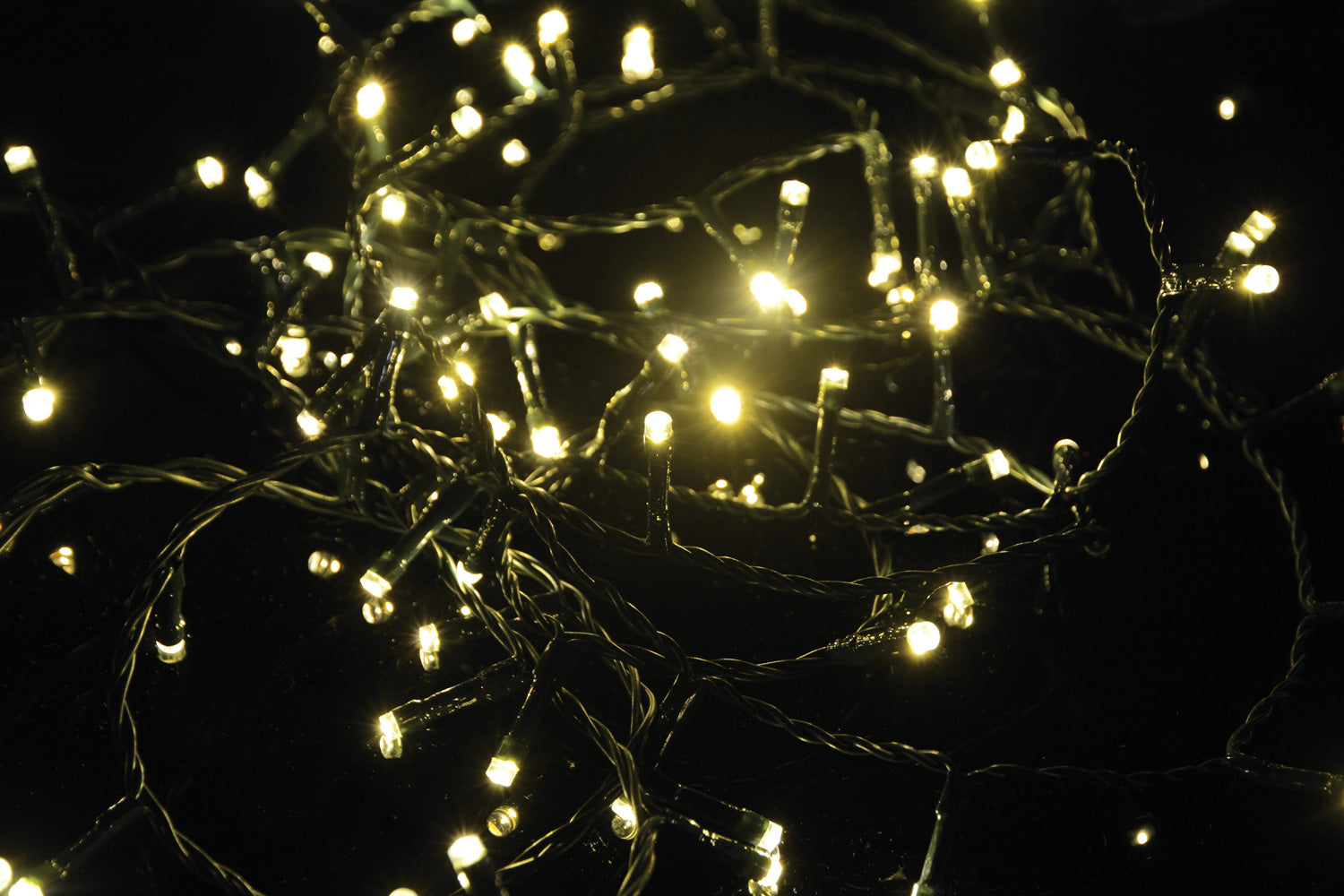 LYYT: 155.465UK, 200 LED Indoor/Sheltered Outdoor String Lights, 10m, Warm White, 24-Hour Timer, Dark Green Cable